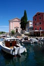 Church and motor boats in Veli Losinj island in Croatia Royalty Free Stock Photo
