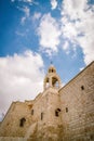 Church of the Nativity. Bell tower and beautiful cloudy sky. Details. Bethlehem, Palestine Royalty Free Stock Photo