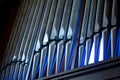 Church organ pipes with blue highlights Royalty Free Stock Photo