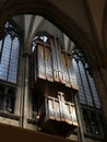 Church organ pipes against an oval window Royalty Free Stock Photo