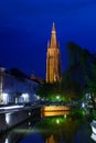 Church of Our Lady Bruges at night from canal Royalty Free Stock Photo