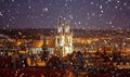 Church of Our Lady in Prague, aerial view, snowing, night lights, Czech Republic