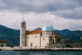 Church of Our Lady on the rocks on the island of Gospa od Skrpjela. Montenegro Royalty Free Stock Photo