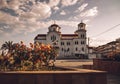 Church in Paralia Katerinis Greece with flowers foreground and vintage look Royalty Free Stock Photo