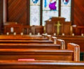 Church Pews with Stained Glass Royalty Free Stock Photo