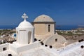 Church in Pyrgos Kallistis and Panoramic view to Santorini island