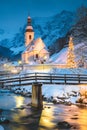 Church of Ramsau in winter twilight, Bavaria, Germany Royalty Free Stock Photo