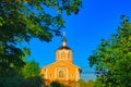 Church in the rays of the rising morning sun