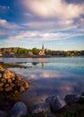 Church reflects in the water in Mahone bay