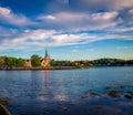 Church reflects in the water in Mahone bay