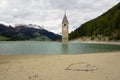 Church at Reschensee Lago di Resia in north italy Royalty Free Stock Photo