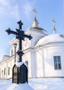 Black cross in memory of Christians buried in this place installed before temple in Verh-Nevinsky.