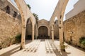 Church roofless for weddings with white chairs.