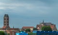 2 church ruins above blue container offices in port, Wismar, Germany