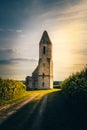 Church ruins in Hungary in the middle of a cornfield. She stands on Lake Balaton in Somogyvamos, photographed romantic sunset Royalty Free Stock Photo