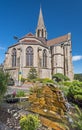 Church Saint Firmin in Firminy city, the fountain is at foreground. Saint-Etienne Metropole, France