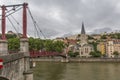 Church of Saint Georges and footbridge, Lyon, France. horizontal view of Lyon and Saone River in France Royalty Free Stock Photo