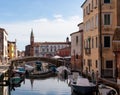 Chioggia - Church of Saint James Apostle with view of canal Vena nestled in charming town of Chioggia Royalty Free Stock Photo