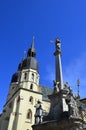 Church of Saint Nicholas in Trnava with typical late gothic architecture and two massive towers. Royalty Free Stock Photo