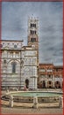 Church San Michele in Foro, Lucca, Tuscany, Italy Fountain in front of church