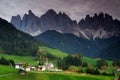 The church Santa Maddalena with the impressive Odle Mountains Group in the background at sunset. Royalty Free Stock Photo