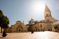 Church of Santa Sofia and its bell tower with blue sky in Benevento (Italy)