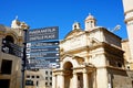 Church and signpost, Valletta. Royalty Free Stock Photo