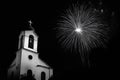 Church silhouette at night with bright firework display in black and white Royalty Free Stock Photo