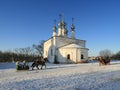 Church and sledge Royalty Free Stock Photo