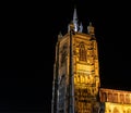 Norwich cathedral spire illuminated during the hours of darkness