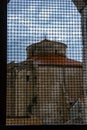 Church of St. Donatus seen through the metal grating