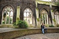 St Dunstan in the East Church Garden in London with visitors relaxing