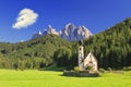 The church St. Johann in Ranui in the Villnoess / Funes valley in the Dolomites, South Tyrol, Italy Royalty Free Stock Photo