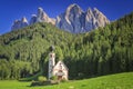 The church St. Johann in Ranui in the Villnoess / Funes valley in the Dolomites, South Tyrol, Italy Royalty Free Stock Photo