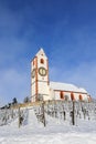 Church St. Moritz over the snow-covered vine yard in winter, Hallau