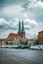 Church of St. Nicholas in Berlin. Germany. Beautiful cityscape, street, parking, cars.