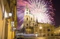Church of St. Nicholas (Night view ) in the quarter of Mala Strana in Prague and holiday fireworks, Czech Republic Royalty Free Stock Photo
