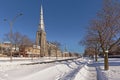 Church of St. Peter the Apostle and Boulevard Rene-Levesque in the snow