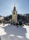 Church of St. Peter and Paul Horni Prysk in sunny winter day. Czech Republic