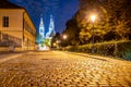 Church of St. Peter and Paul on Vysehrad. Cobbled street by night. Prague, Czech Republic Royalty Free Stock Photo