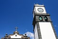 The Church of St. Sebastian is one of the main attractions of Ponta Delgada. Tower with a clock and bells. Azores, Sao Miguel Royalty Free Stock Photo