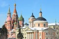 The church of St. Varvara and St. Basil`s Cathedral in sunny winter day. Street Varvarka. Moscow, Russia Royalty Free Stock Photo