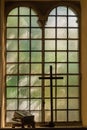 Church Stained-glass Window, The Holy Bible and Wooden Cross Royalty Free Stock Photo