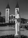 Church and statue of Madonna in Medjugorje, a place of pilgrimage from all over the world Royalty Free Stock Photo