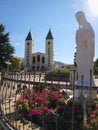 Church and statue of Madonna in Medjugorje, a place of pilgrimage from all over the world Royalty Free Stock Photo