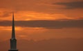 Church steeple set against sunset Royalty Free Stock Photo