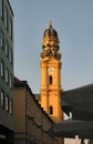 Church steeple at sunset in Munich, Germany