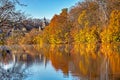 Fall Colours Reflect in the Waters of the Grand River in Paris, Ontario, Canada