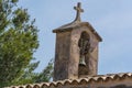 Church tower with bell in Spanish style Royalty Free Stock Photo