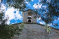 Church tower with bell in Spanish style Royalty Free Stock Photo